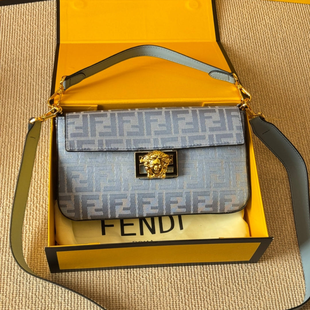 Vintage embossed metal buckle baguette bag