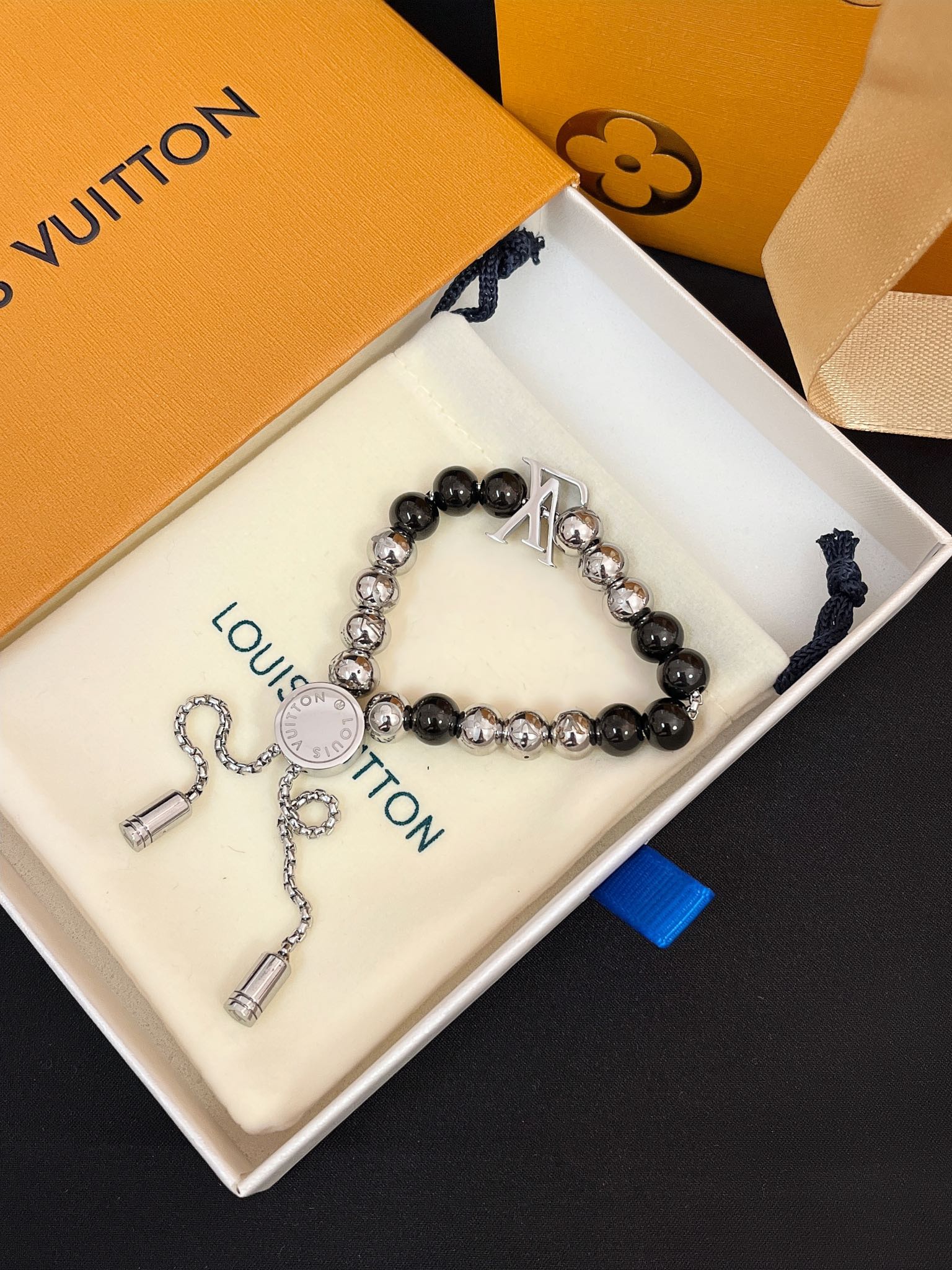 Unisex steel ball drawstring bracelet
