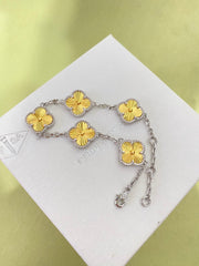 Gold four-leaf clover bracelet