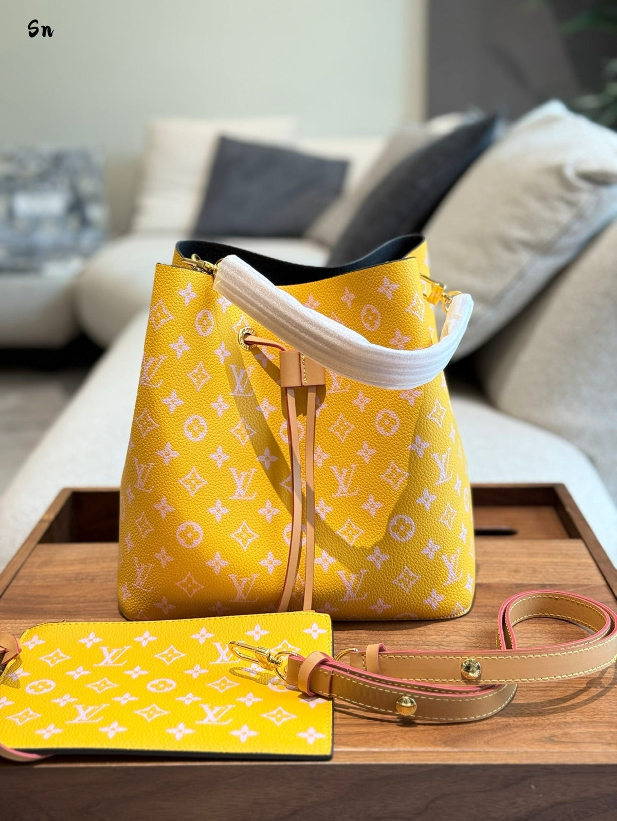 Leather rainbow bucket bag
