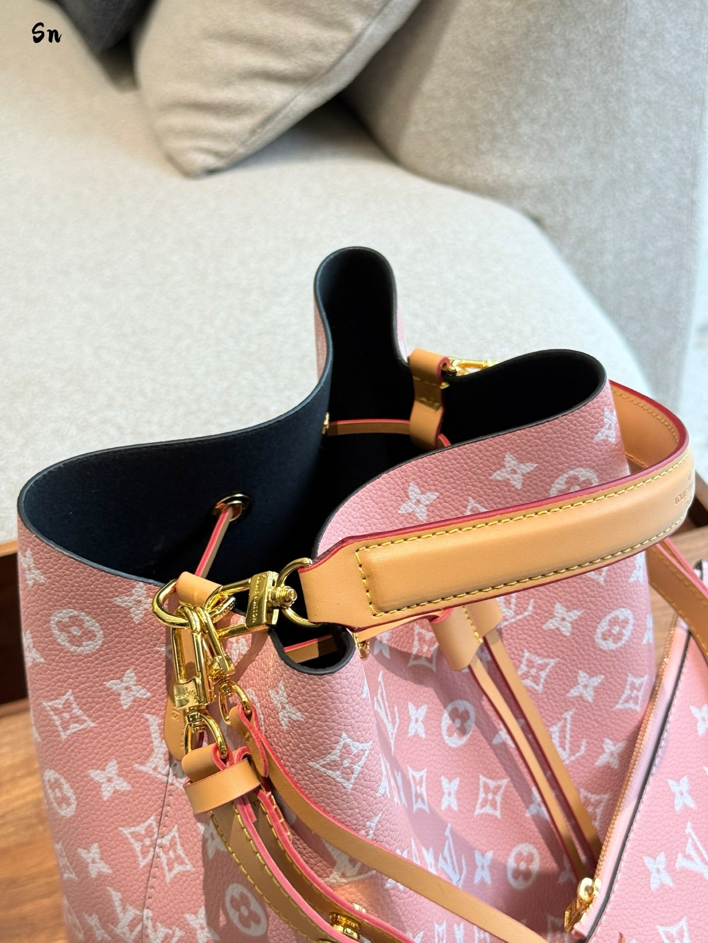 Leather rainbow bucket bag