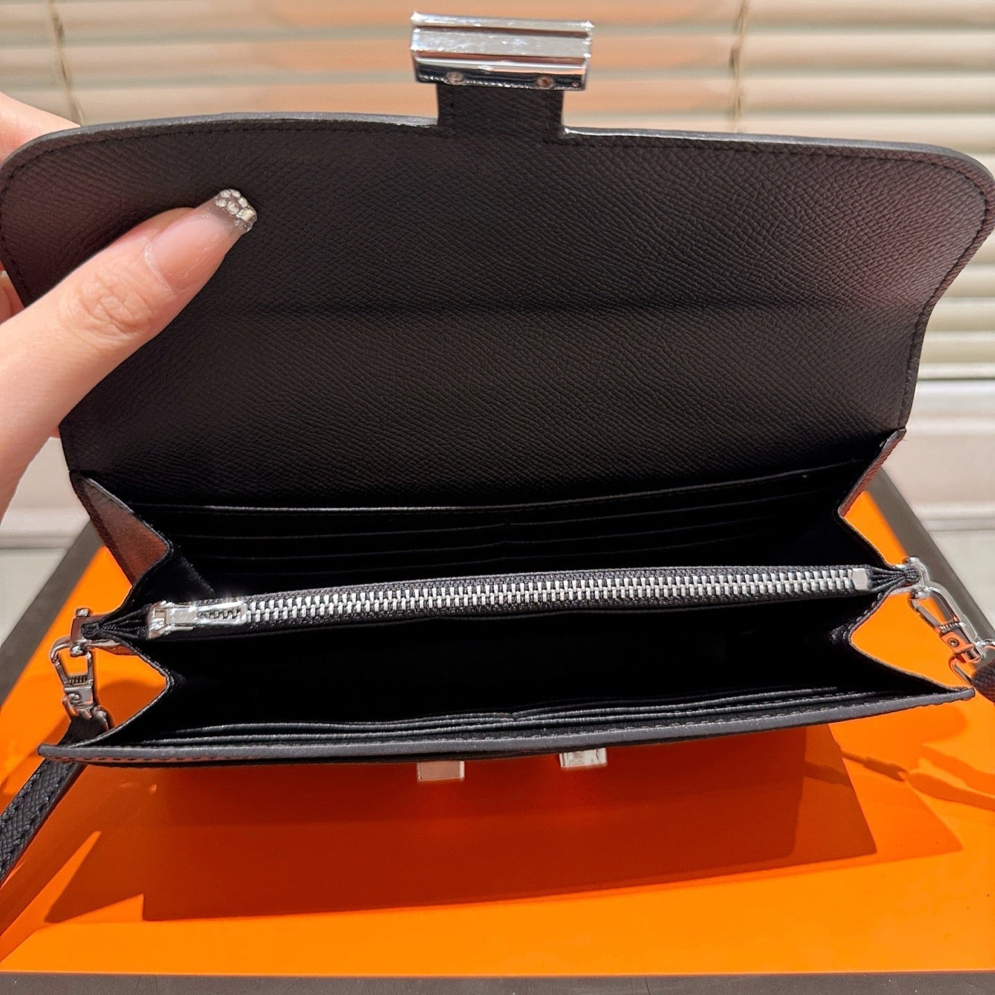 Silver buckle messenger bag
