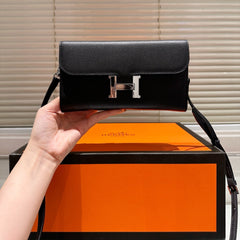 Silver buckle messenger bag