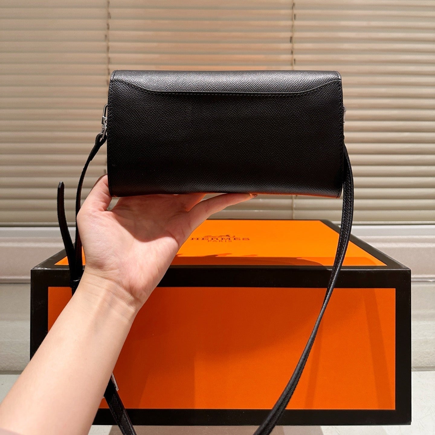 Silver buckle messenger bag
