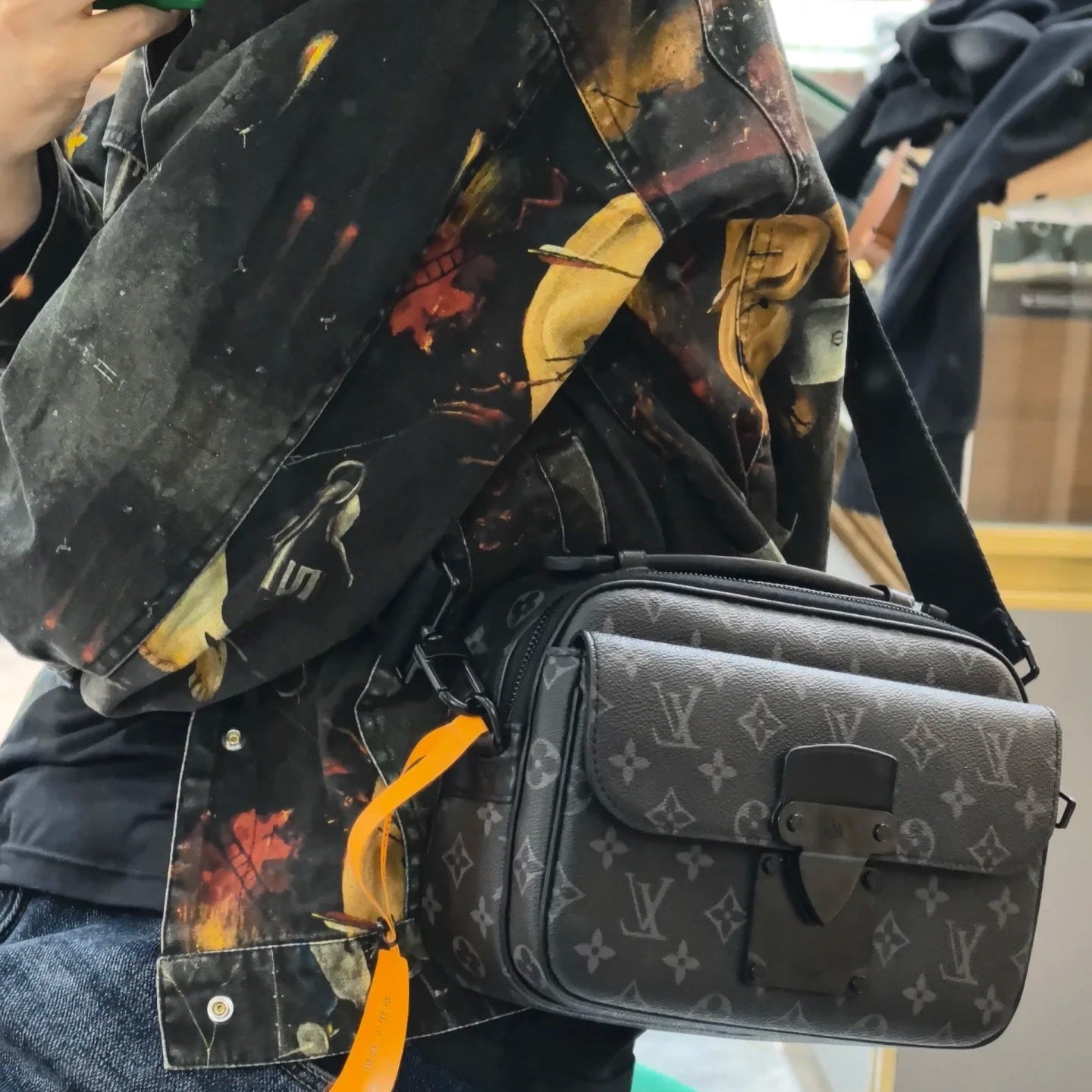 Handsome men's embossed messenger bag