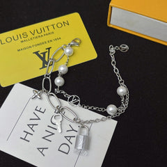 Floral lock pendant silver bracelet