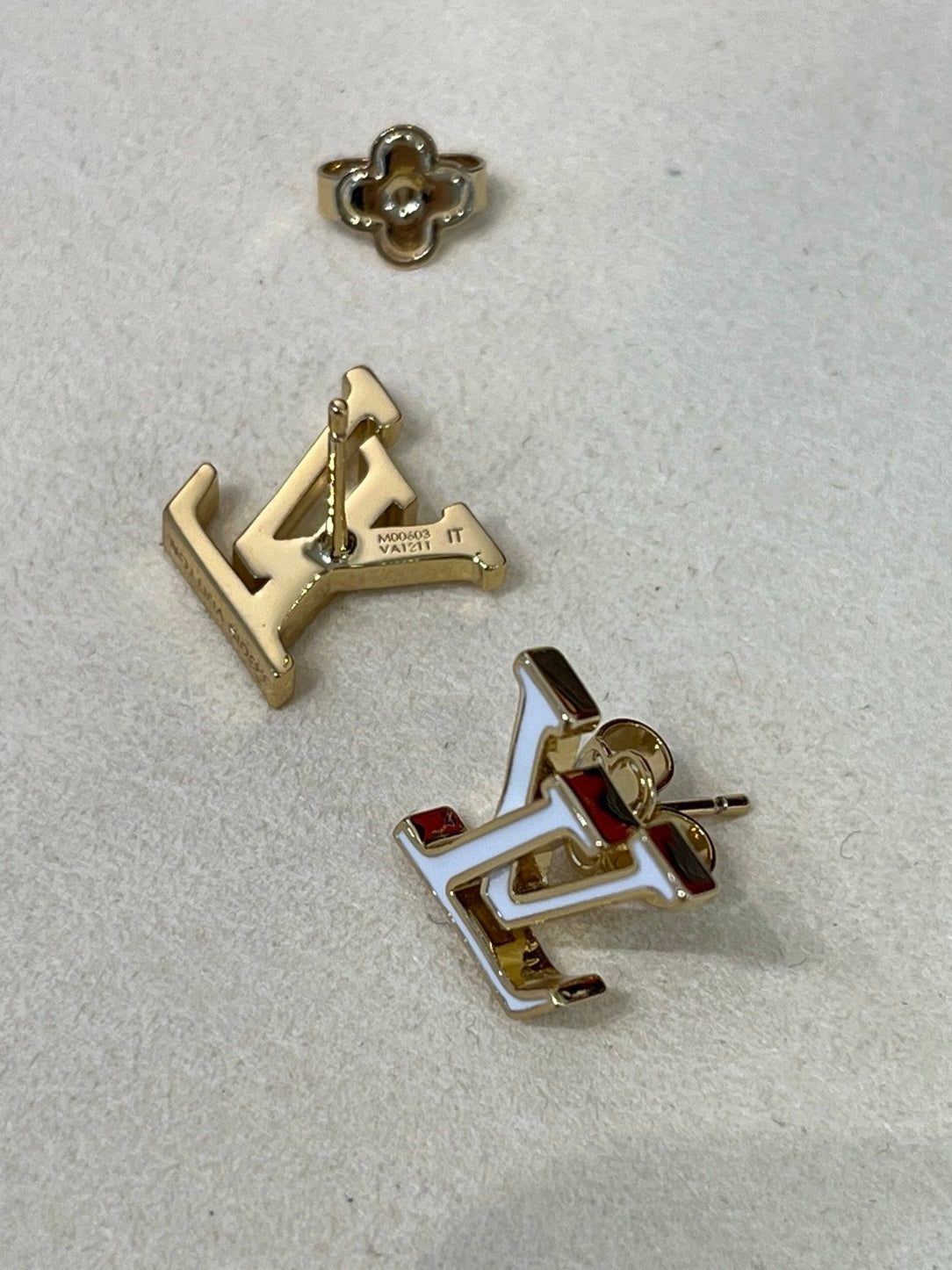 Fashionable white enamel stud earrings